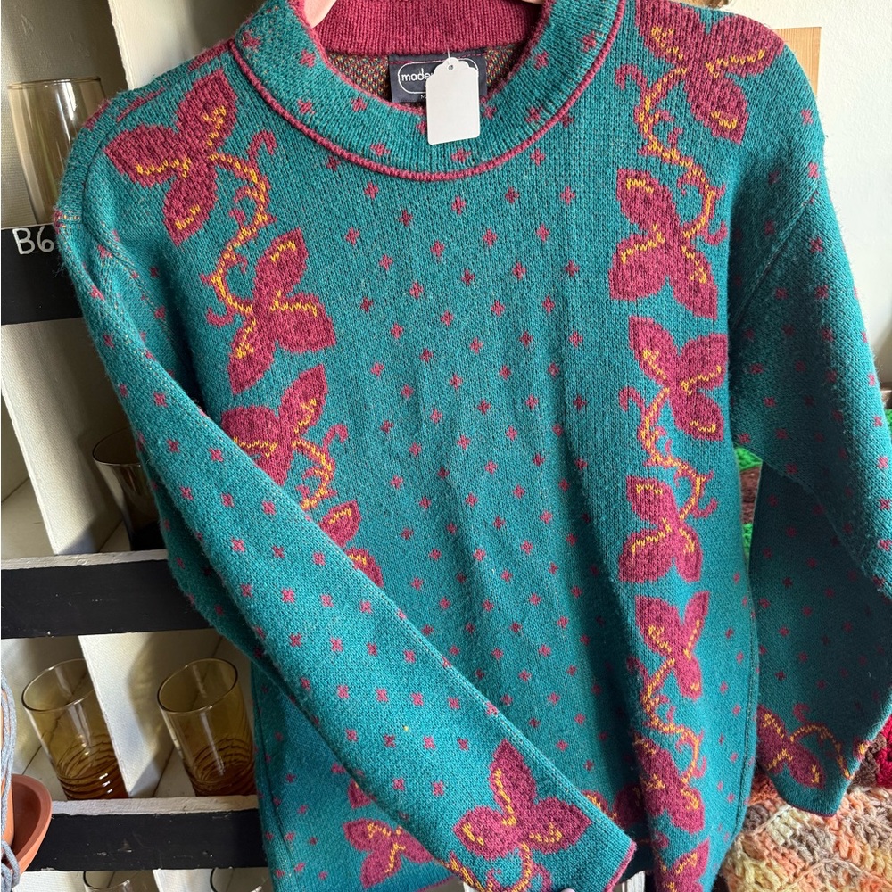 Blue and Pink Crew Neck Sweater with Intricate Patterns